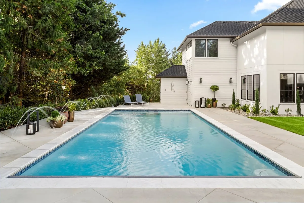 In-ground pool with blue water